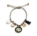 Pulsera negra múltiples dijes